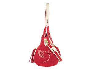 Ivory Leather and Red Tapestry Bucket Bag side view