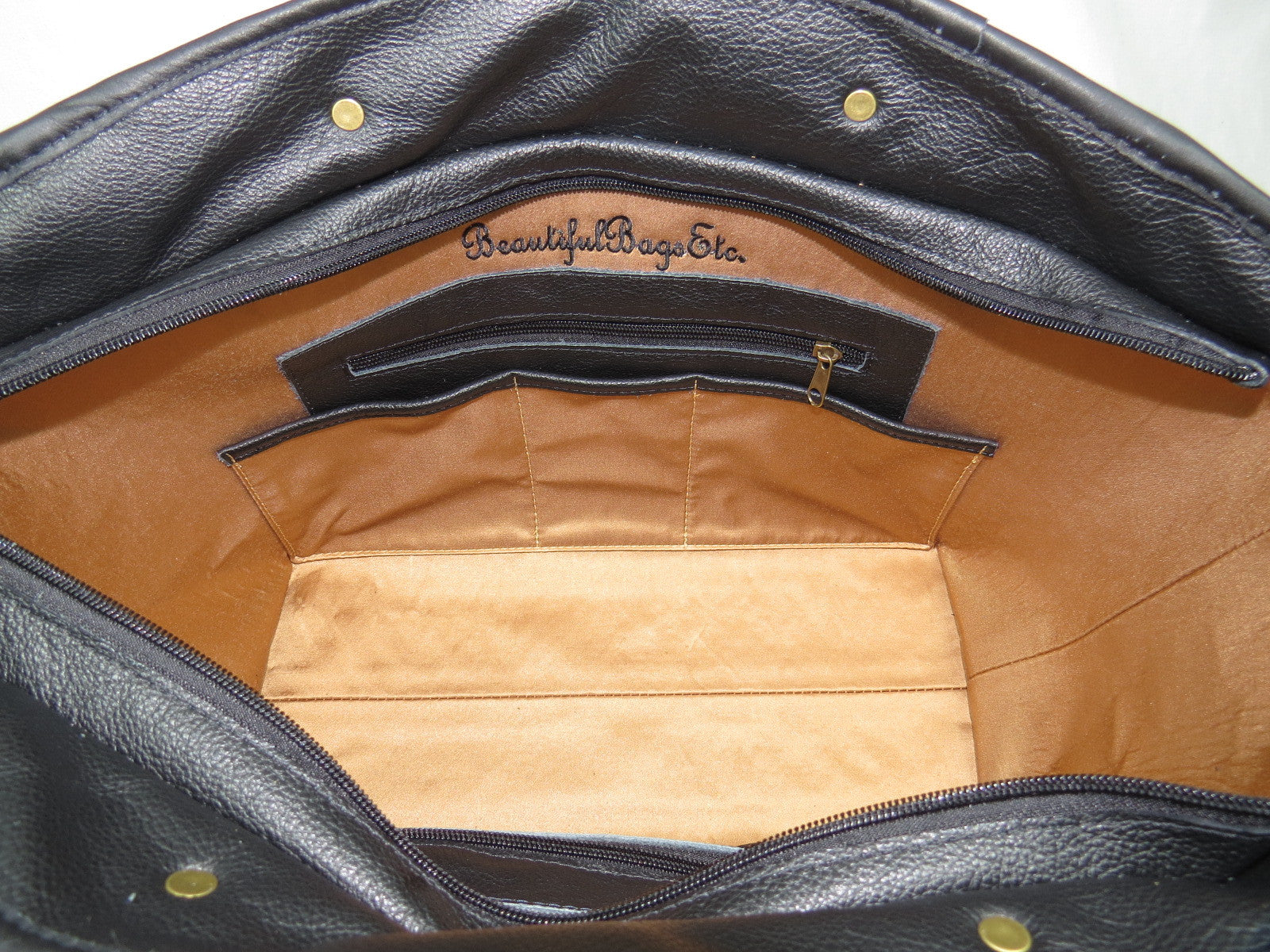 Leather and Tapestry X Tote interior pockets