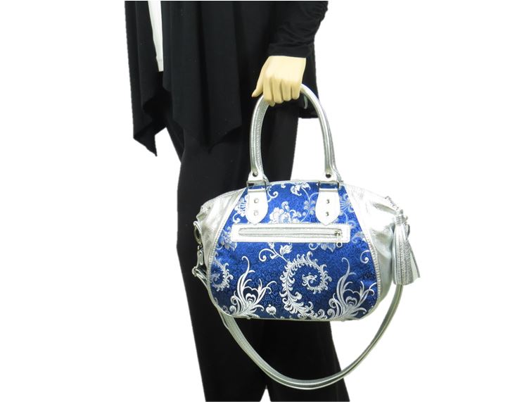 Metallic Silver Leather and Blue Brocade Satchel hand model
