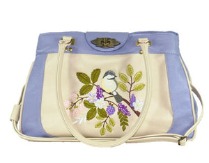 Purple and Beige Embroidered Chickadee Leather Satchel relaxed handle view